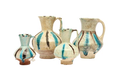 Lot 10 - FOUR SMALL SELJUK SPLASHED POTTERY JUGS
