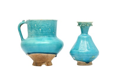 Lot 8 - A KASHAN TURQUOISE-GLAZED POTTERY JUG AND SPRINKLER