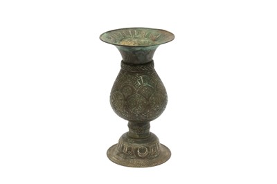 Lot 11 - AN ENGRAVED AND SILVER-INLAID BRONZE JUG
