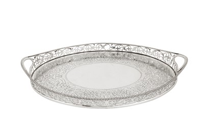 Lot 376 - A small Victorian sterling silver twin handled tray, London 1901 by Charles Stuart Harris