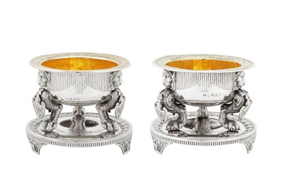 Lot 428 - Earl of Lonsdale service - A large and fine matched pair of George III sterling silver ‘Egyptomania’ salts, London 1803 by Digby Scott & Benjamin Smith and London 1810 by Benjamin Smith & James Smith