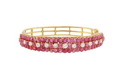 Lot 12 - A ruby and diamond bangle