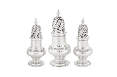Lot 515 - A George II sterling silver graduated set of casters, London 1743 by Elizabeth Godfrey (reg. 29th June 1741)