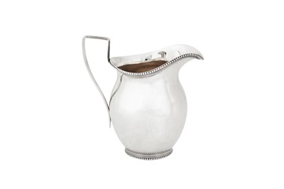 Lot 265 - An early 19th century Dutch silver milk jug, Amsterdam 1804 by Jan Buysen (active from 1776) retailed by Willem Diemont (1767-1842)