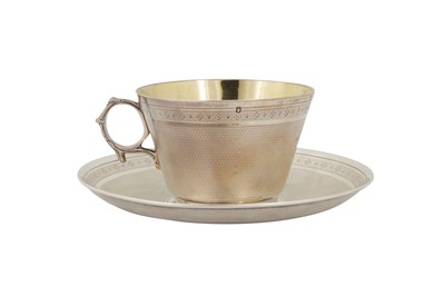 Lot 256 - A late 19th century French 950 standard silver chocolate cup and saucer, Paris circa 1870 by César Tonnelier (active 1845-1882)