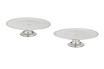 Lot 522 - A pair of George I Britannia standard silver footed salvers (tazzas), London 1720 by Matthew Lofthouse (reg. 28th Aug 1701)