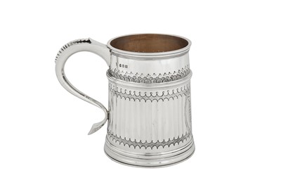 Lot 367 - A George V Britannia standard silver pint mug, London 1928 by Charles Stuart Harris