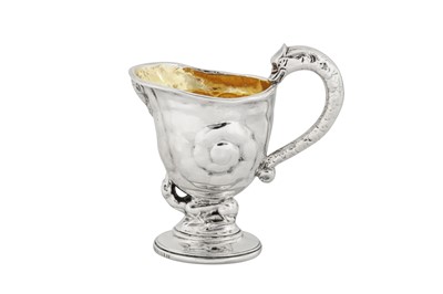 Lot 397 - A Victorian sterling silver cast cream jug, London 1871 by Hunt and Roskell