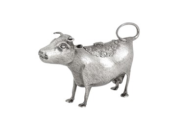 Lot 492 - A George III sterling silver cow creamer, London 1767 by John Schuppe (reg. 28th June 1753)