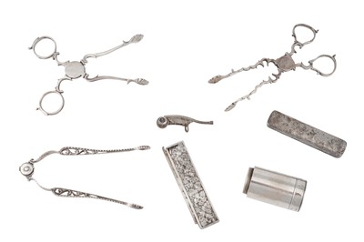Lot 1220 - A PAIR OF GEORGE III STERLING SILVER TEA TONGS, LONDON CIRCA 1763 BY SIMON COLEY