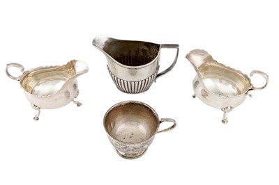 Lot 1185 - A PAIR OF VICTORIAN STERLING SILVER SAUCEBOATS, LONDON 1885 BY ALDWINCKLE AND SLATER