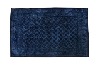 Lot 92 - A LARGE CHINESE DARK BLUE CARPET
