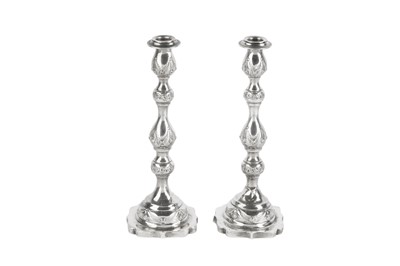 Lot 1135 - JUDAICA - A PAIR OF GEORGE V STERLING SILVER SABBATH CANDLESTICKS, LONDON 1929 BY MORRIS SALKIND OR MORRIS STERNBERG