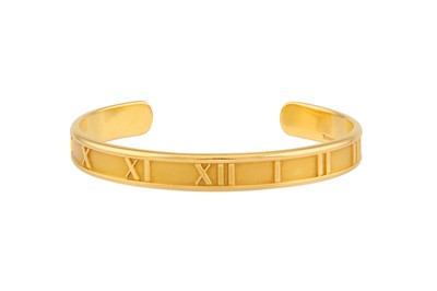 Lot 210 - AN 'ATLAS' BANGLE BY TIFFANY & CO