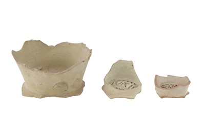 Lot 104 - THREE UNGLAZED EARTHENWARE WATER JUG FILTERS