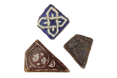 Lot 113 - THREE MEDIEVAL IRANIAN POTTERY TILES