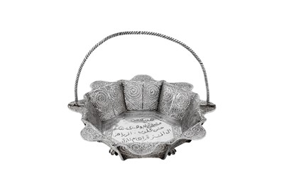 Lot 198 - A mid-20th century Sudanese silver basket, Omdurman dated 1952