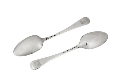 Lot 313 - Huguenot interest - A pair of George II sterling silver dessert spoons, London 1741 by Louis Ourry (reg. 21 Aug 1740)