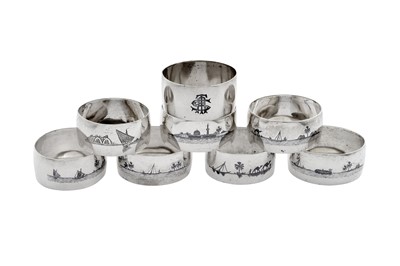Lot 223 - A mixed group of eight mid-20th century Iraqi silver and niello napkin rings, Omara or Basra circa 1940