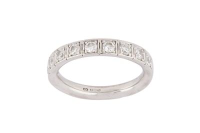 Lot 87 - A DIAMOND HALF HOOP RING