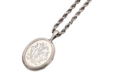 Lot 1031 - A SILVER LOCKET