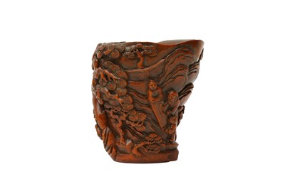 Lot 93 - A CHINESE CARVED BOXWOOD 'SCHOLARS AND BOYS' LIBATION CUP