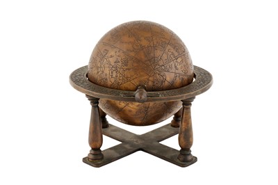 Lot 238 - AN ENGRAVED BRASS ISLAMIC CELESTIAL GLOBE