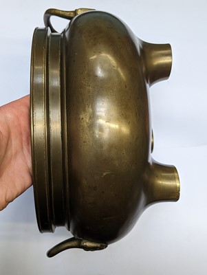 Lot 42 - A CHINESE BRONZE TRIPOD CENSER
