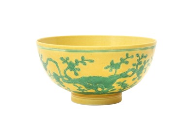 Lot 33 - A CHINESE YELLOW-GROUND 'BIRDS AND PEACHES' BOWL