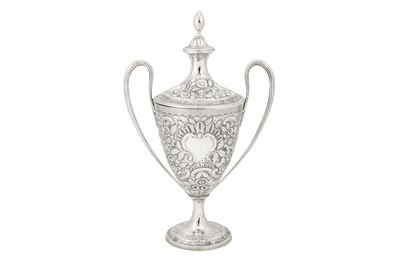 Lot 421 - A George III sterling silver twin handled cup and cover, London 1790 by Thomas Howell of Bath (probably)