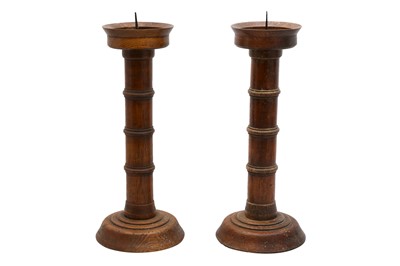 Lot 1560 - A PAIR OF TURNED OAK PRICKET CANDLESTICKS