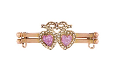 Lot 54 - AN AMETHYST AND HALF PEARL SWEETHEART BROOCH