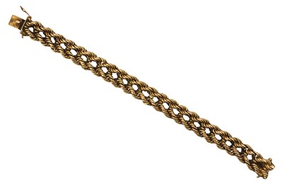 Lot 1032 - A FANCY-LINK YELLOW METAL BRACELET