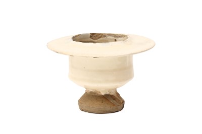 Lot 825 - A CHINESE CIZHOU WHITE-GLAZED LAMP STAND OR CENSER