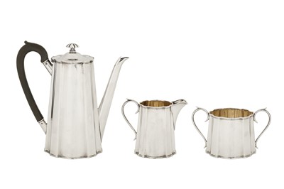 Lot 299 - A George V sterling silver three-piece twin handled coffee service, London 1929 by Ellis & Co, retailed by Tiffany and Co