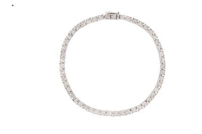 Lot 1021 - A DIAMOND BRACELET