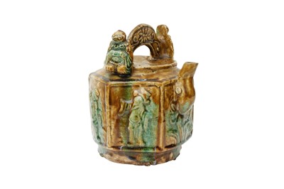 Lot 847 - A CHINESE SANCAI-GLAZED 'IMMORTALS' KETTLE