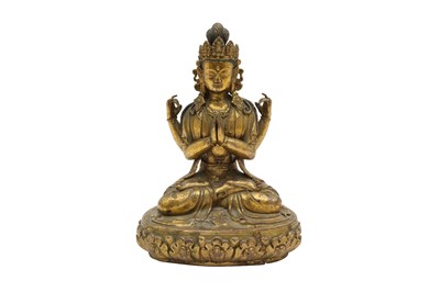 Lot 168 - A TIBETAN GILT BRONZE FOUR-ARMED STATUE OF AVALOKITESHVARA