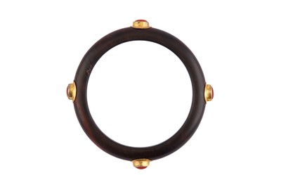 Lot 53 - A WOOD BANGLE
