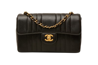 Lot 453 - Chanel Dark Brown Vertical Quilted Flap Bag