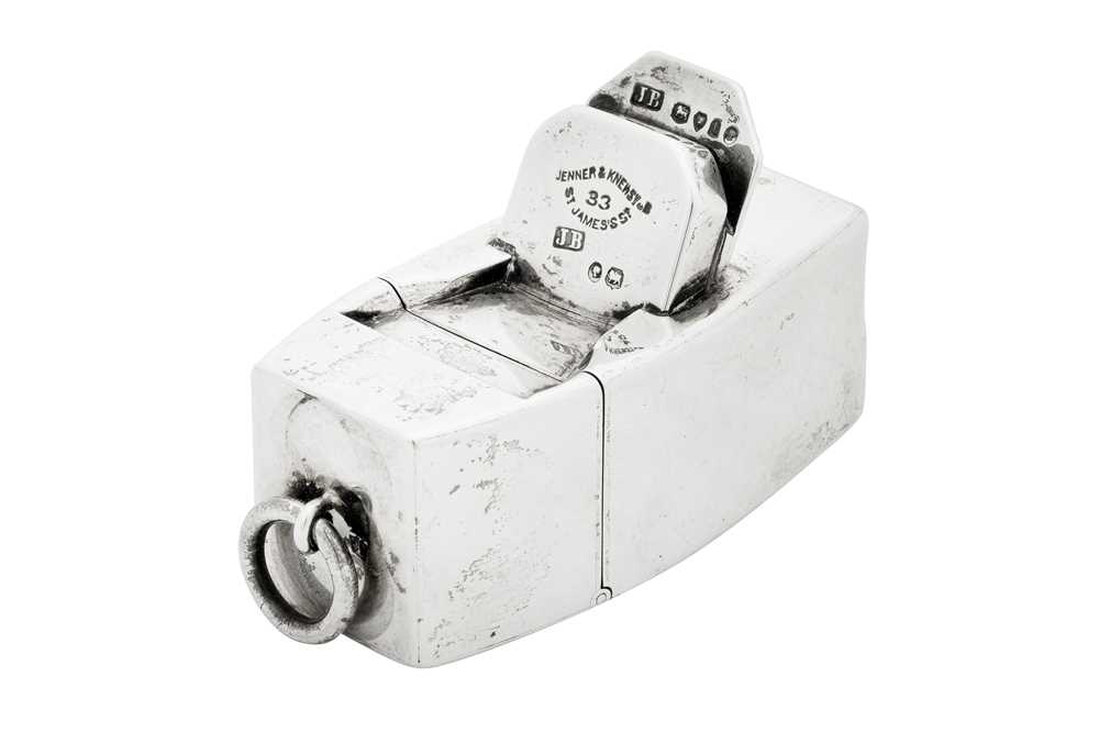 Lot 64 - A rare Victorian sterling silver novelty travelling inkwell London 1874 by Jane Brownett (reg. 2nd Jan 1868)