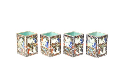Lot 229 - A SET OF FOUR CHINESE FAMILLE-ROSE SQUARE BRUSH POTS