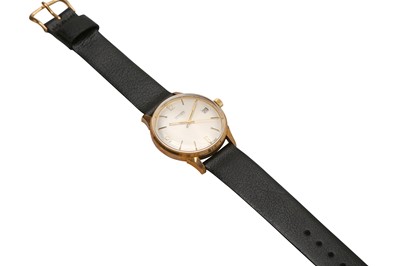 Lot 64 - A GENTS VINTAGE 9-CARAT GOLD GARRARD & CO DRESS WATCH