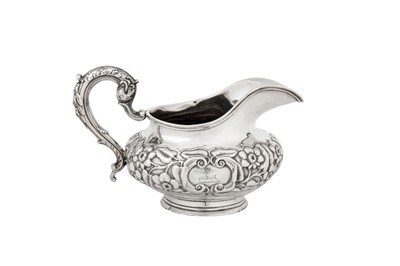 Lot 400 - A William IV Irish sterling silver milk jug, Dublin 1832 by Robert W Smith