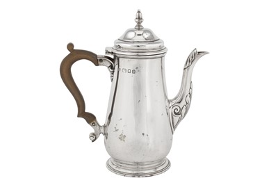 Lot 273 - A George V sterling silver bachelor coffee pot, London 1933 by Wakely and Wheeler