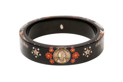 Lot 402 - Chanel Black Resin Motif Bangle
