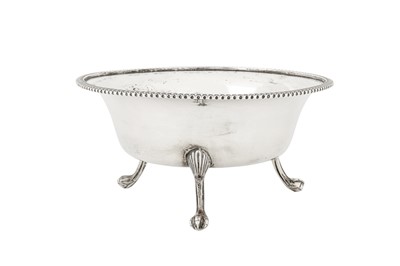 Lot 306 - An Edwardian sterling silver three footed bowl, London 1909 by Holland, Aldwinckle and Slater