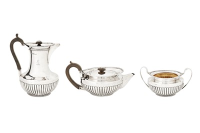 Lot 315 - An assembled Victorian sterling silver three-piece tea and coffee service, partly London 1881 by Hawksworth, Eyre and Co Ltd