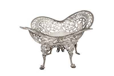 Lot 310 - An Edwardian sterling silver fruit basket or bowl, London 1905 by Reid and Sons