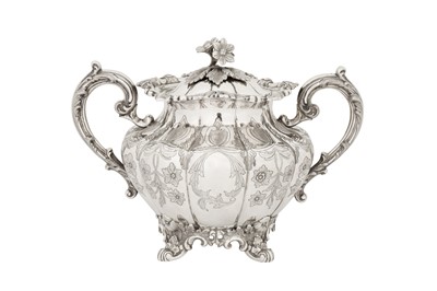 Lot 88 - A mid-19th century Indian colonial silver covered twin handled sugar bowl, Calcutta circa 1850 by Hamilton and Co